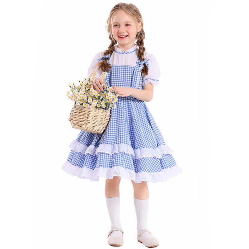 Girls blue gingham pinafore dress with white eyelet lace tiers and bow detail