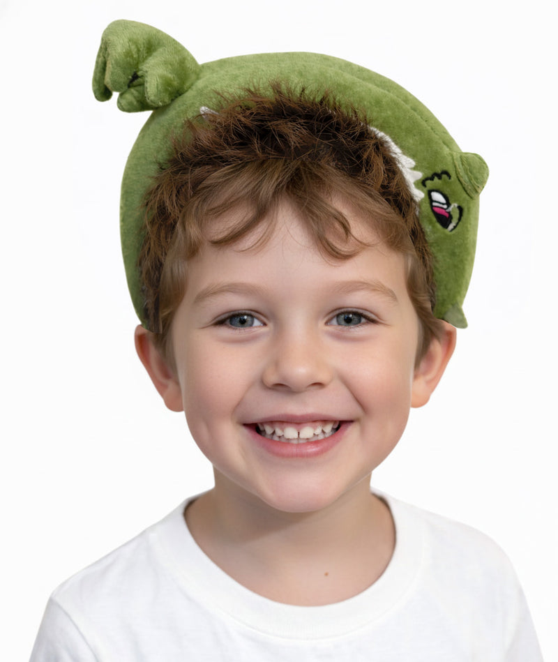 Kids green dinosaur headband with open chomping jaws and teeth arching over head