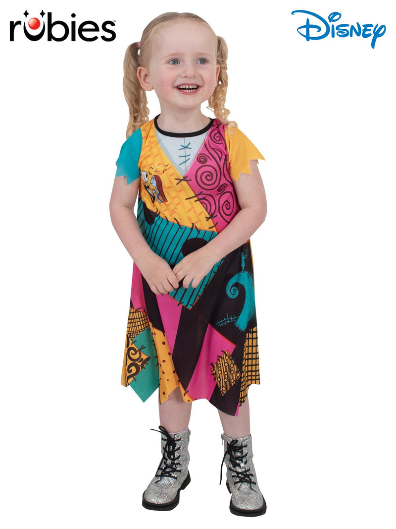 Toddler girl wearing Kids Sally Costume dress with patchwork print and raw edges from The Nightmare Before Christmas