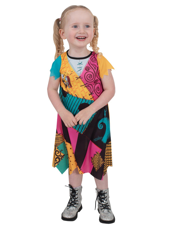 Close-up of Sally costume dress showing Jack and Sally character art at chest with multi-color patchwork print