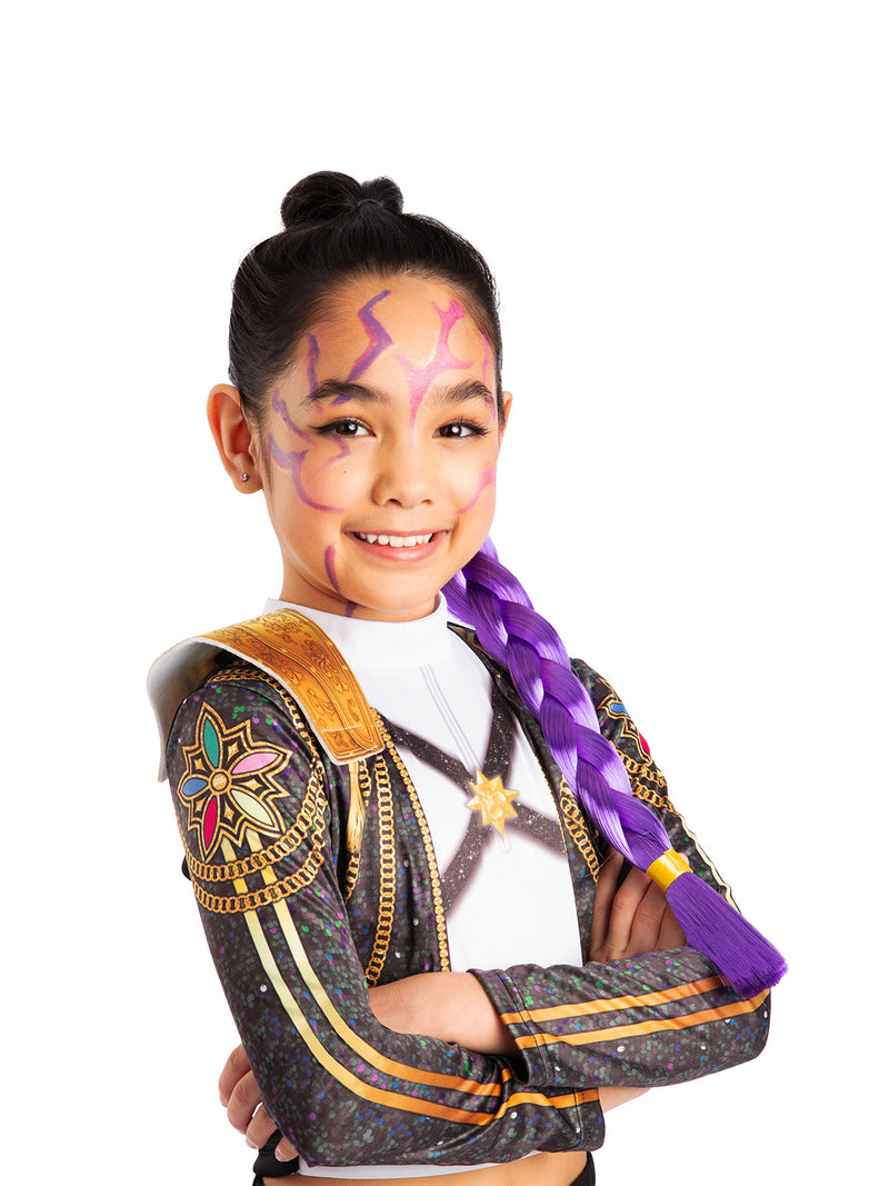 Child wearing purple and pink lightning bolt face paint from K-Pop Demon Hunters set with asymmetrical swirls across forehead and cheeks