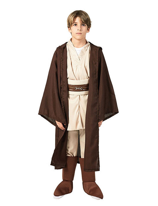 Child wearing brown hooded robe costume with cream tunic and pants