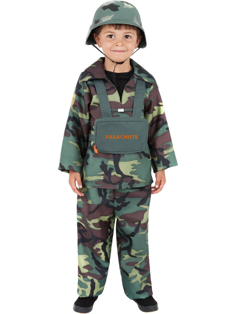 Child wearing woodland camouflage army soldier costume with helmet and parachute pack