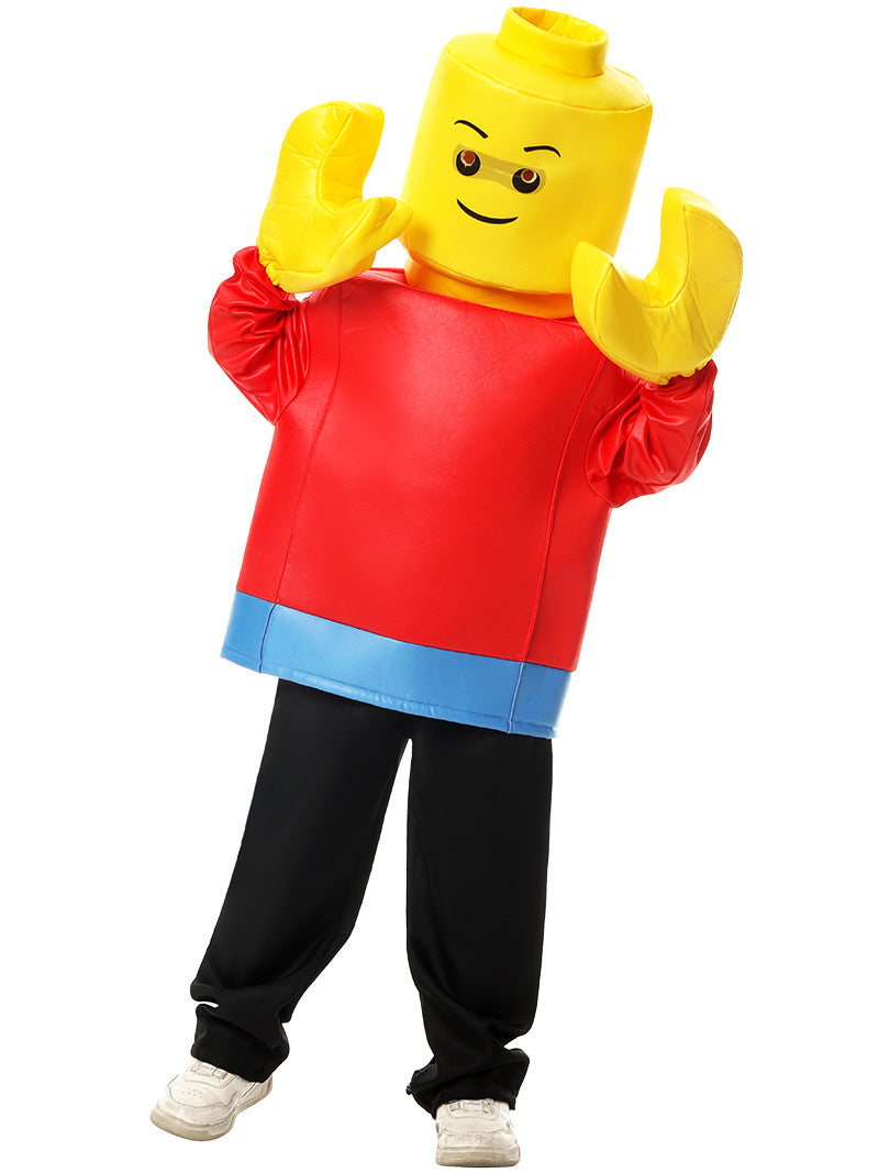 Child wearing bright yellow cube headpiece with printed face and red tunic costume