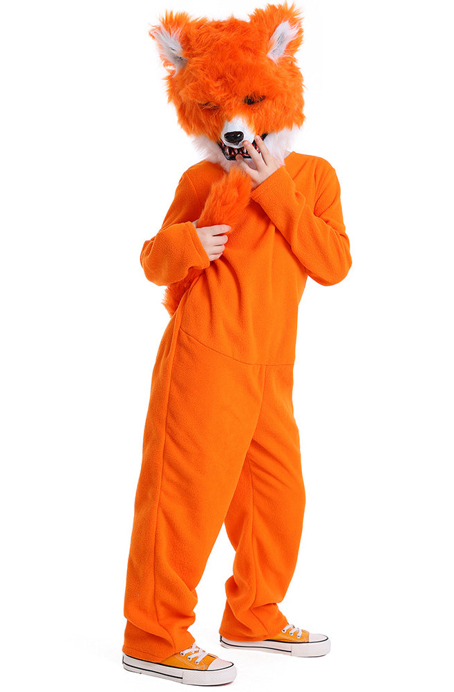 Child wearing orange fox onesie costume with fluffy tail and fox ears headband