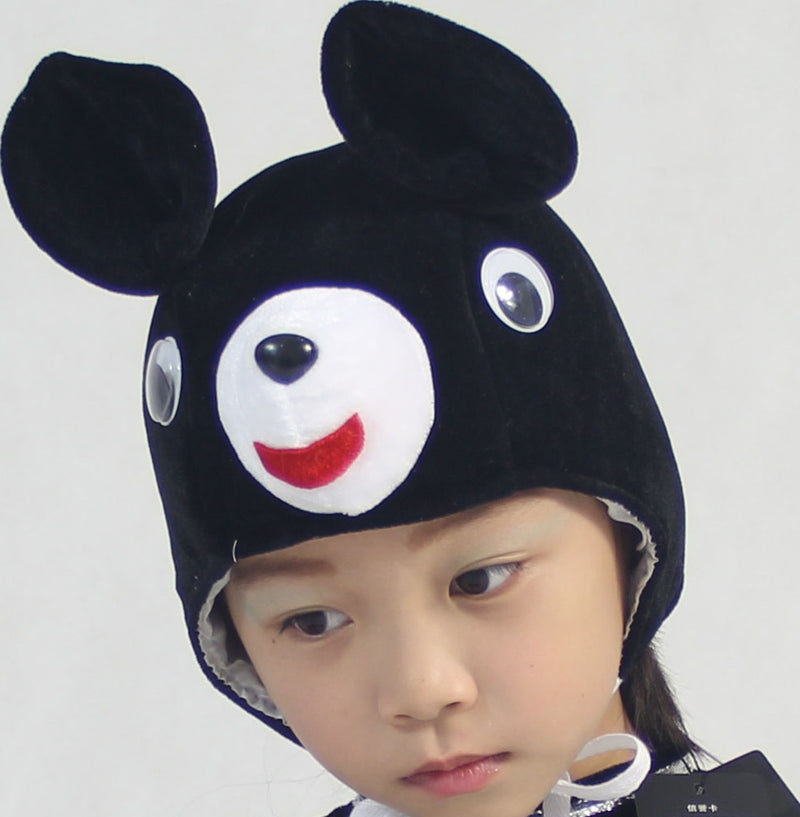 Kids black bear plush headpiece with white muzzle, dome eyes and rounded ears — front view