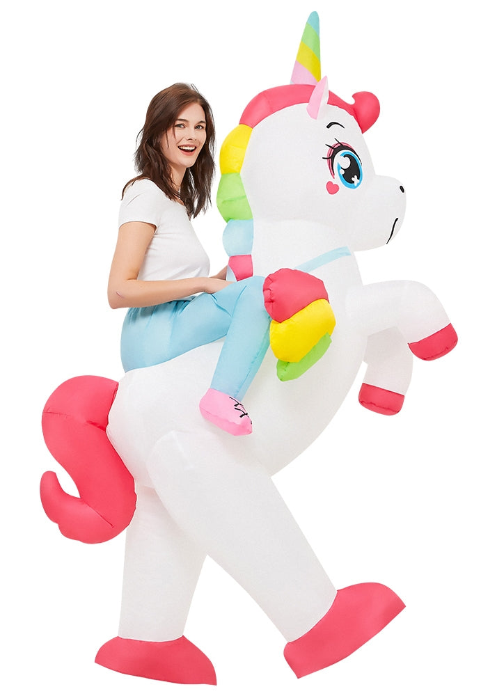 Adult wearing white inflatable unicorn costume with rainbow mane and horn, creating ride-on illusion