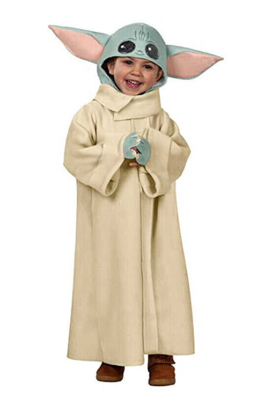 Child wearing full-length cream robe with green hooded headpiece featuring large pointed ears