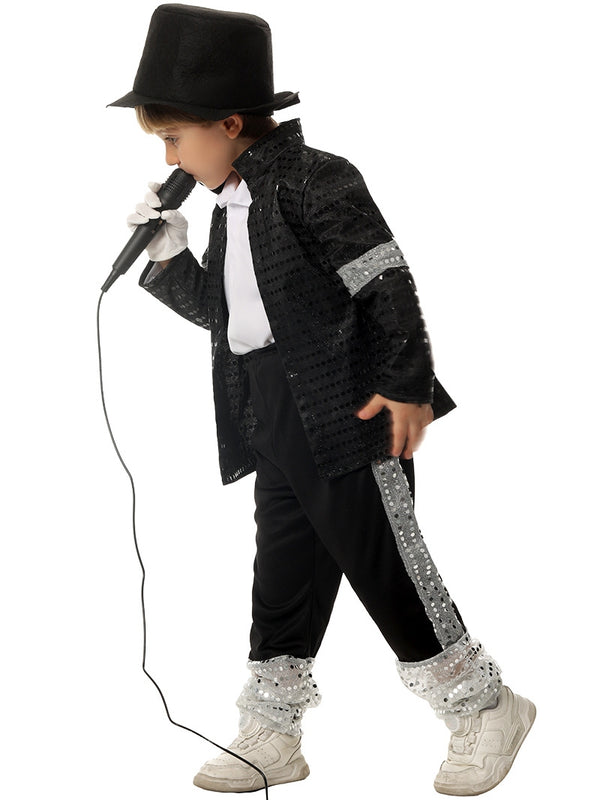 Child wearing black sequined jacket with silver trim, black fedora, and single white glove in 80s pop star costume