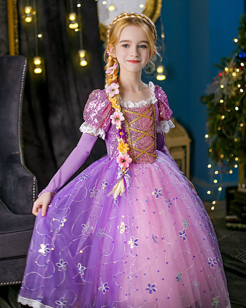 Purple and pink princess costume dress with gold lacing and sequined bodice on white background