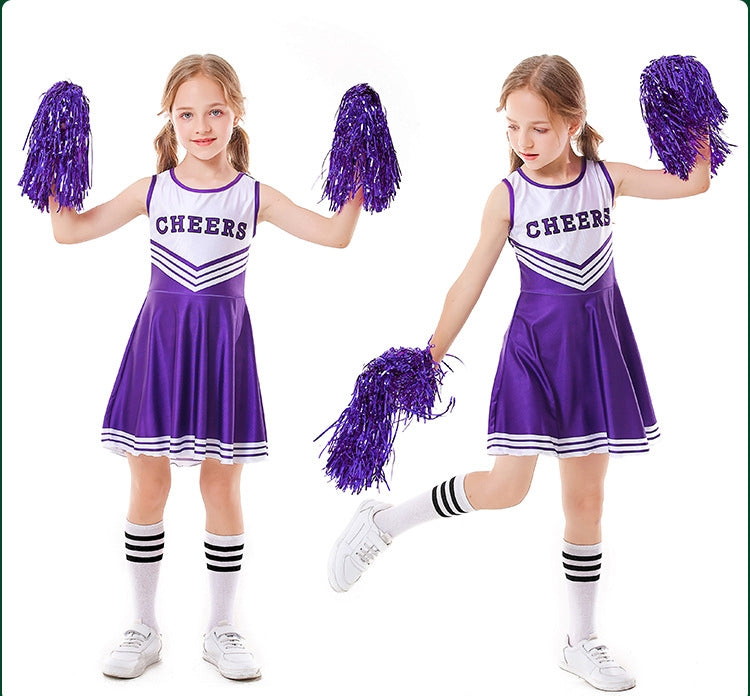 Child wearing purple and white cheerleader dress with CHEERS lettering and pleated skirt