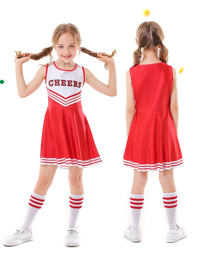 Child wearing red and white cheerleader dress with pom-poms