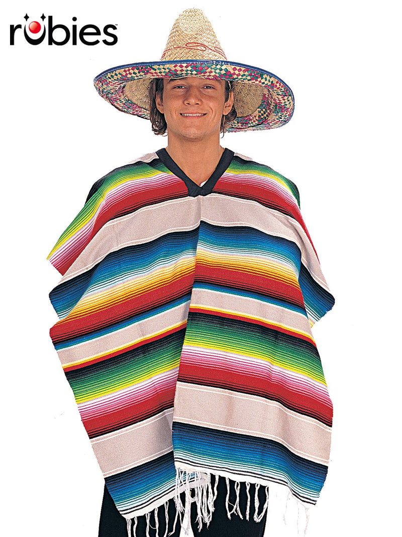Adult wearing red and rainbow striped Mexican serape poncho with white fringe