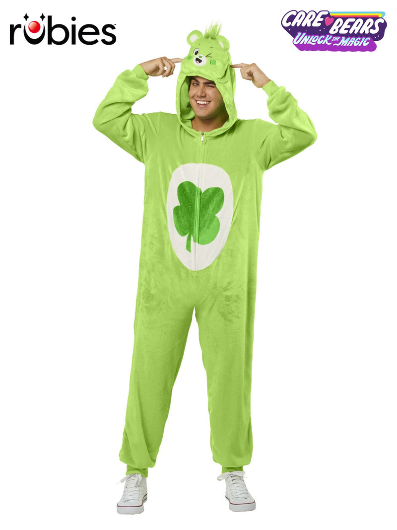 Adult wearing lime green Care Bears Good Luck Bear plush jumpsuit with four-leaf clover belly badge and 3D hood