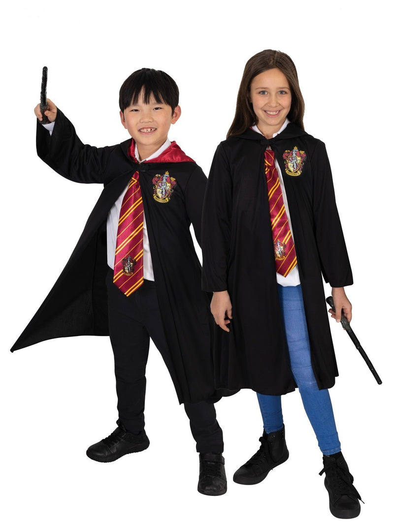 Child wearing black Harry Potter Gryffindor robe with red-lined hood and embroidered house crest