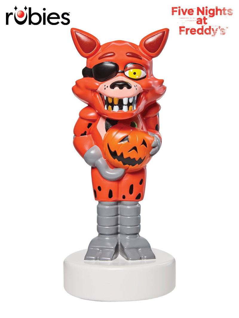 Five Nights at Freddy's Foxy the Pirate Fox light-up figurine holding jack-o'-lantern pumpkin on white base