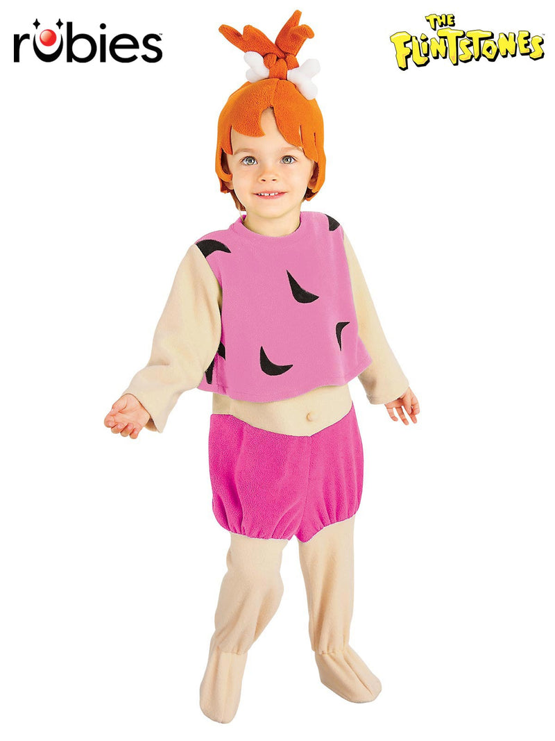 Child wearing pink Pebbles Flintstone jumpsuit costume with orange top-knot wig and bone
