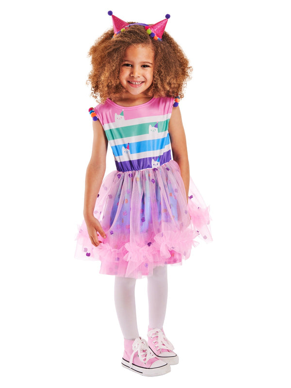 Close-up of Gabby's Dollhouse costume dress bodice with cat face appliqués and pompom shoulder trim