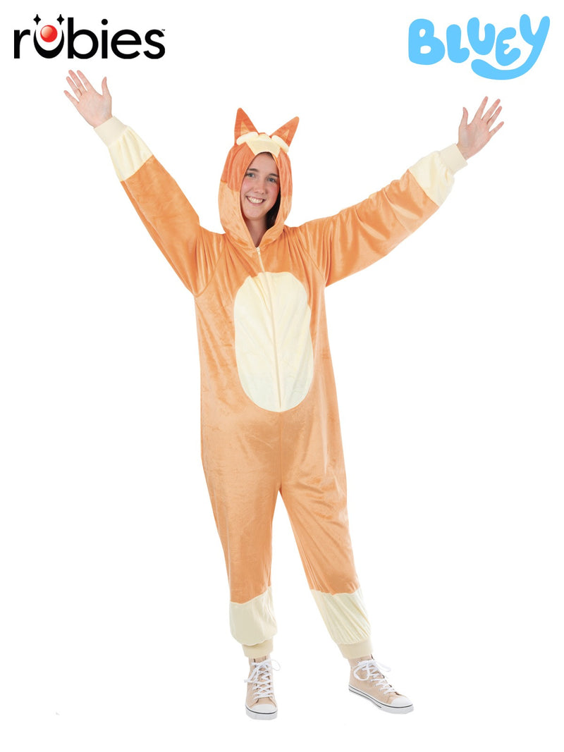 Adult wearing orange Bingo costume from Bluey, full-length plush jumpsuit with digitally printed Red Heeler spots and hooded headpiece with 3D ears