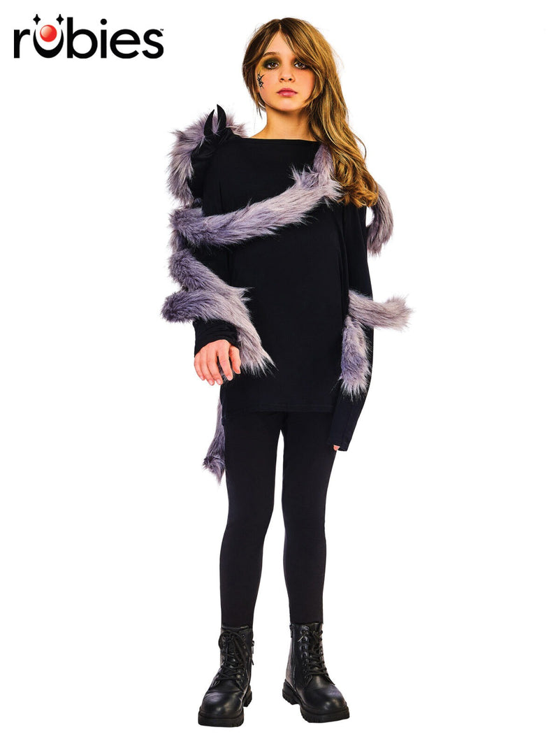 Adult wearing grey plush giant spider harness with eight furry legs wrapped around torso