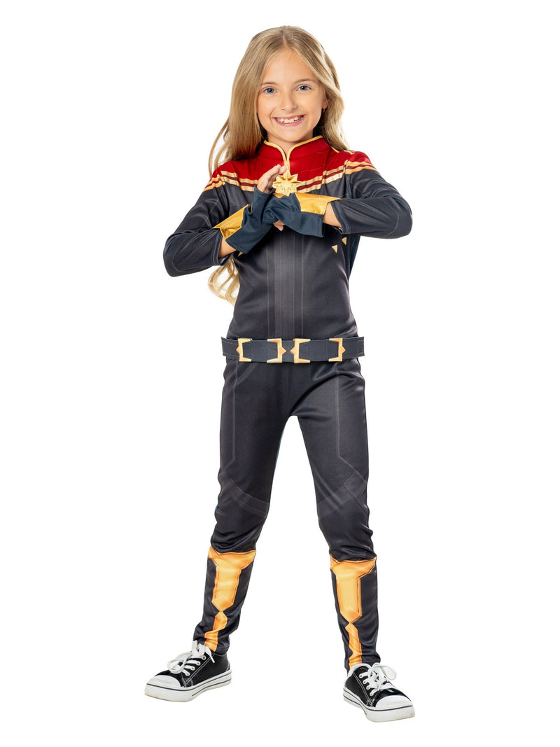 Child wearing Captain Marvel costume with gauntlets and belt, full-length view
