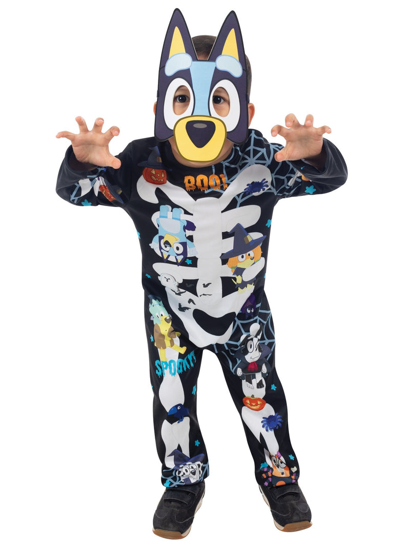 Bluey Halloween jumpsuit showing skeleton bones, pumpkins, ghosts, and cobweb print