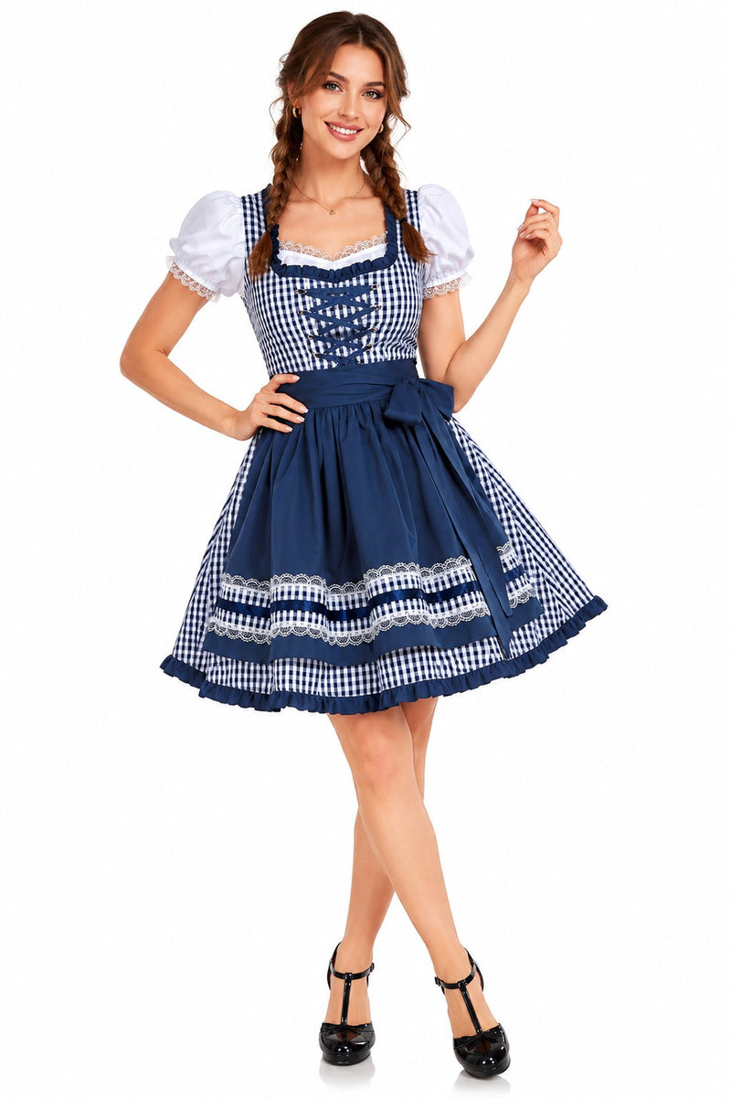 Woman wearing navy blue gingham Oktoberfest dirndl costume with white blouse and apron front view holding a beer