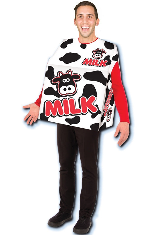 Child wearing white milk carton tunic costume with black cow spots and red MILK text