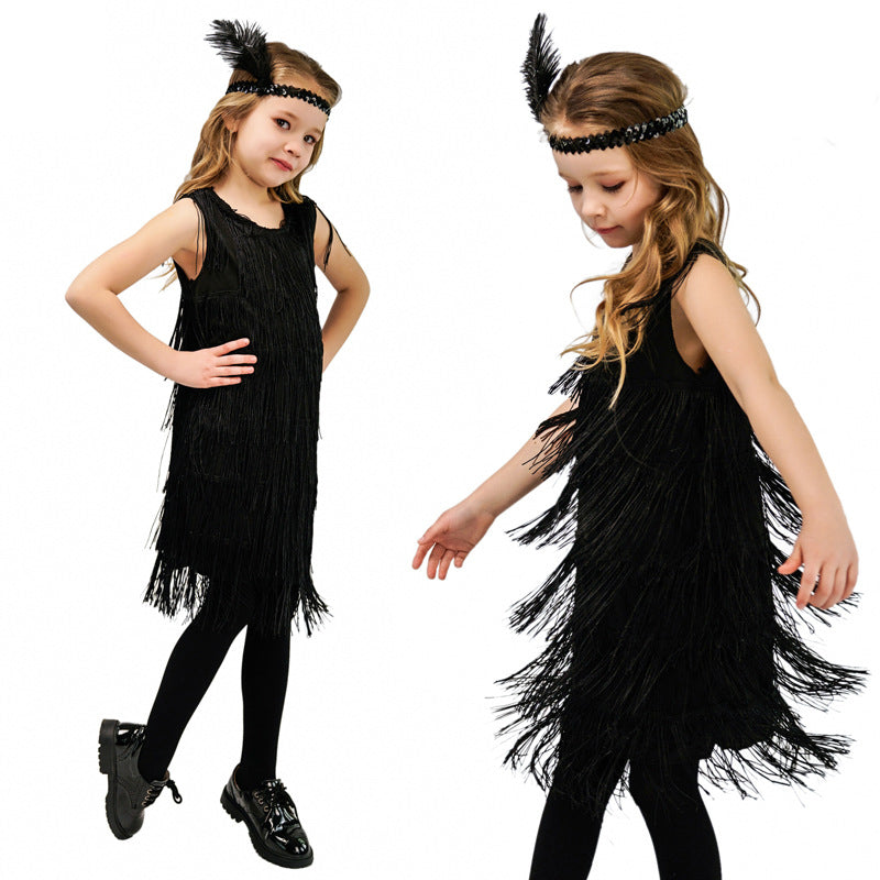 Black fringe flapper dress for kids with feathered headband on white background