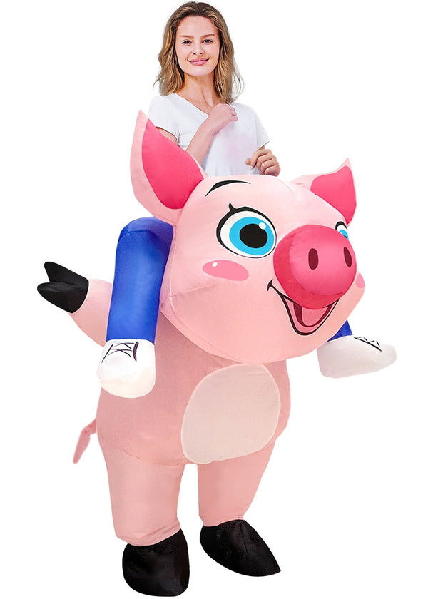 Adult wearing inflatable pink pig costume with ride-on design, showing full-body suit with cartoon pig head and blue pants