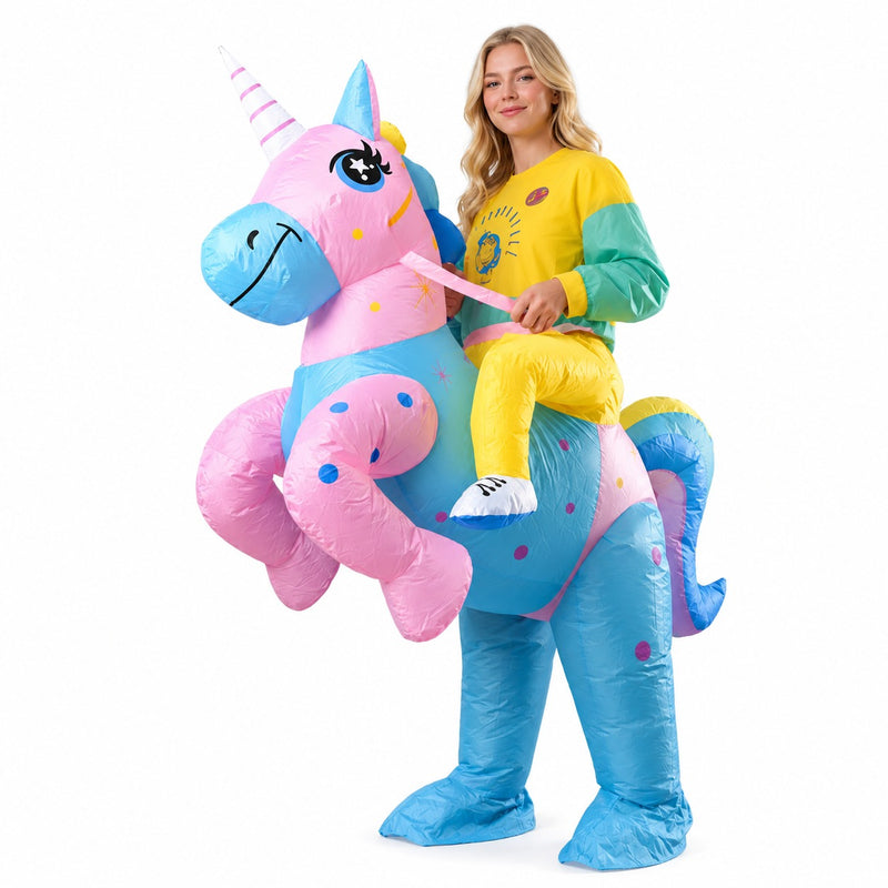 Adult inflatable rainbow unicorn ride-on costume with pink body, striped horn, and polka-dot hooves