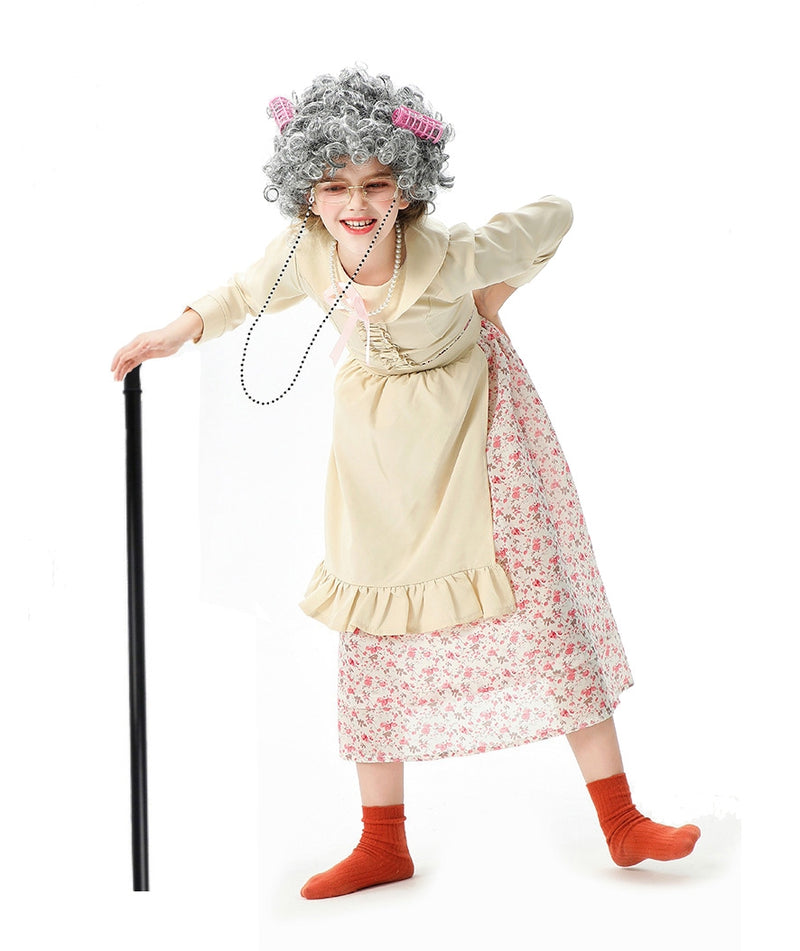 Child wearing complete old lady costume with floral dress, apron, gray wig with curlers, glasses and cane for 100 Days of School