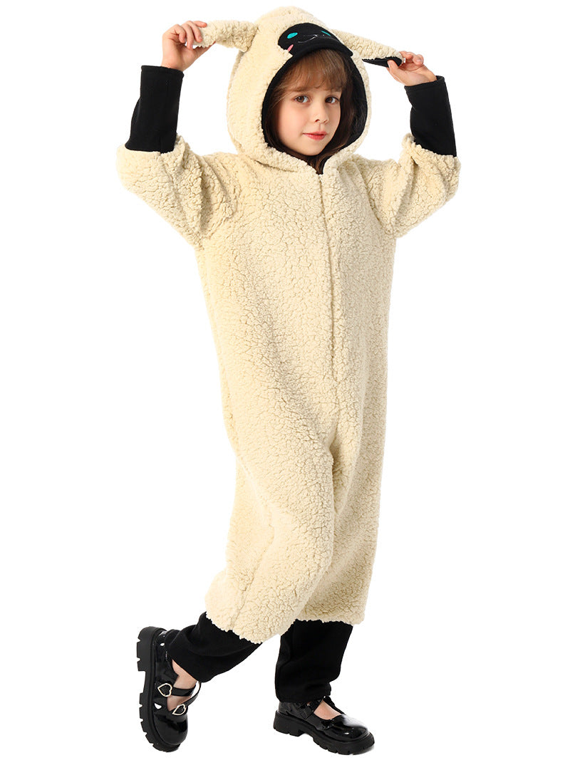 Child wearing cream fluffy sheep costume onesie with embroidered lamb face hood and floppy ears
