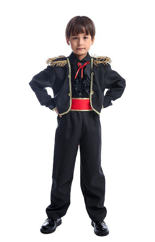 Child wearing black matador costume with gold trim and red sash