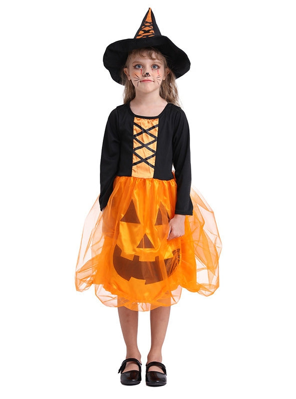 Girl in light-up witch costume with glowing orange pumpkin dress and black pointy hat