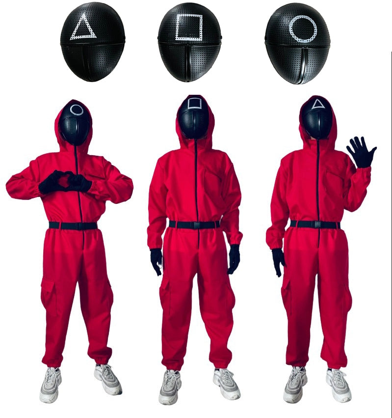 Child wearing red hooded jumpsuit with black geometric face mask and adjustable shoulder straps