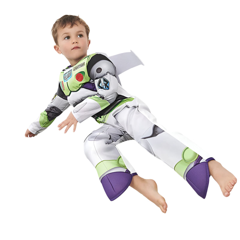 Child wearing inflatable space ranger costume with oversized helmet and chest armour in white, green, purple and black