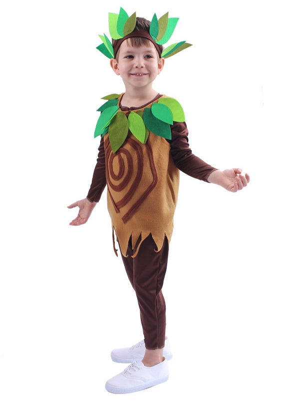 Child wearing full tree costume with leafy headband and trunk tunic showing growth ring pattern