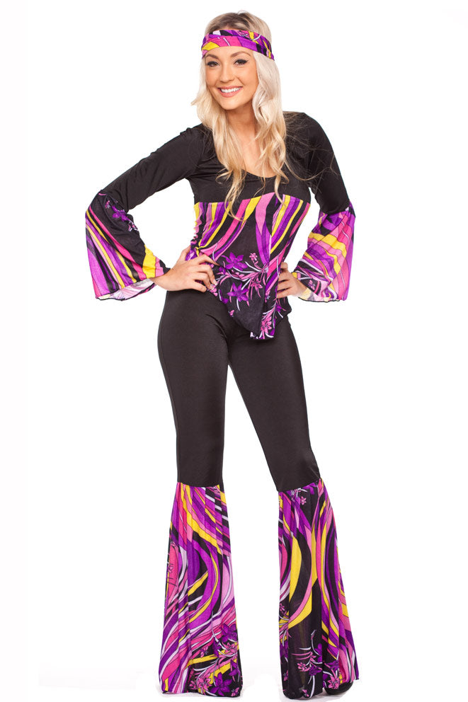 Child wearing black jumpsuit with bright psychedelic print bell-bottoms and matching headband
