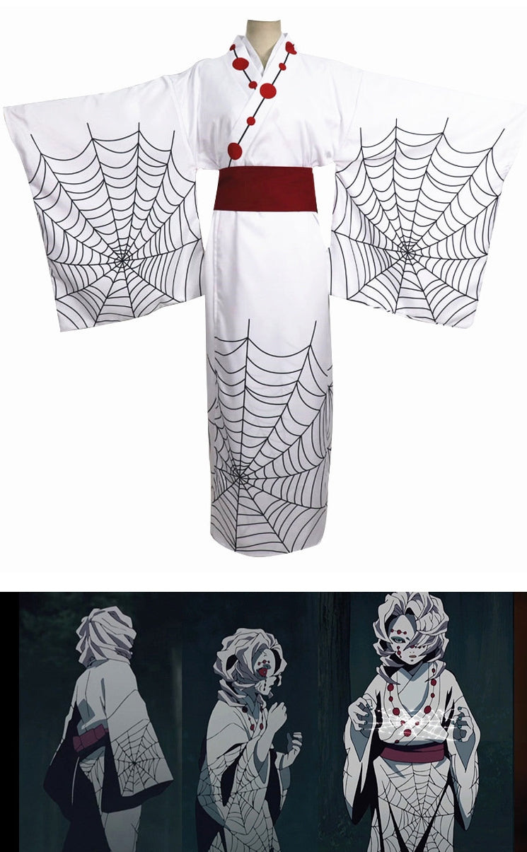 Adult woman wearing white kimono with black spider web print and burgundy obi