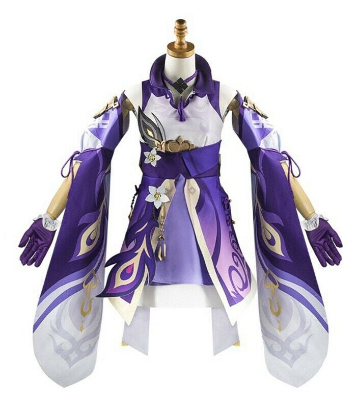 Kids purple fantasy warrior costume with layered dress, detached sleeves and gold ornaments laid flat
